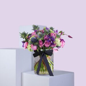 Purple Floral Bunch in glass Vase