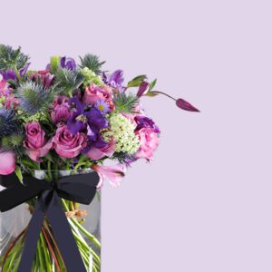 Purple Floral Bunch in glass Vase