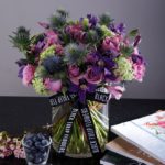 Purple Floral Bunch in glass Vase