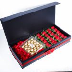 Get romanticized with a complete romantic gift box combined of Red Roses, Red Rose Petals and Ferrero Rocher Chocolate. Product Details: ¼ kg Red Rose Petals Ferrero Rocher Chocolate 24 Red Roses in a box by June Flowers